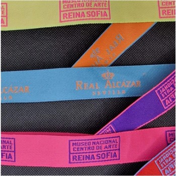 "Black and red Jacquard woven lanyards with custom text and logo – AIGAT"